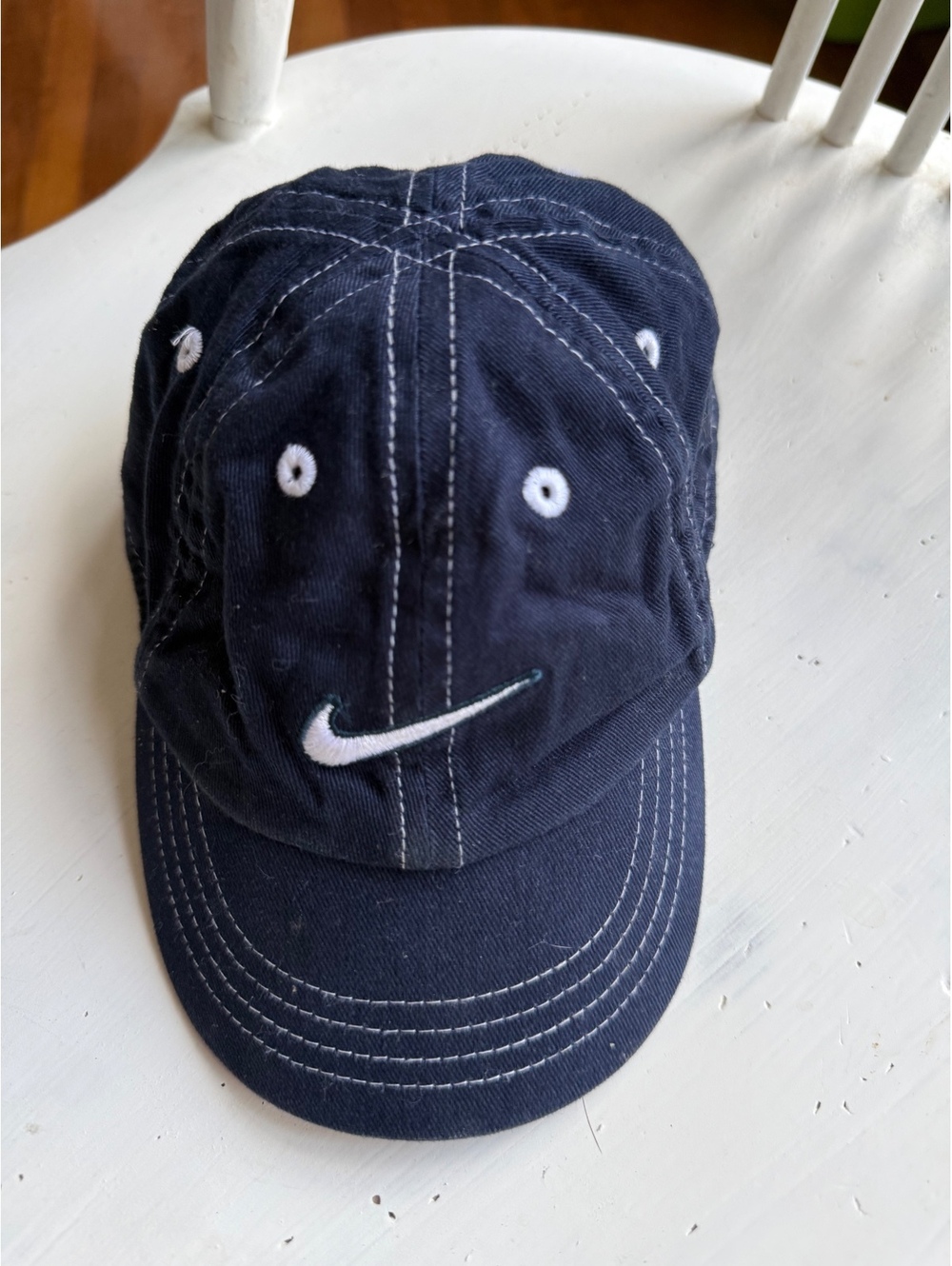 Newborn Nike Navy Adjustable Baseball Cap with White Logo